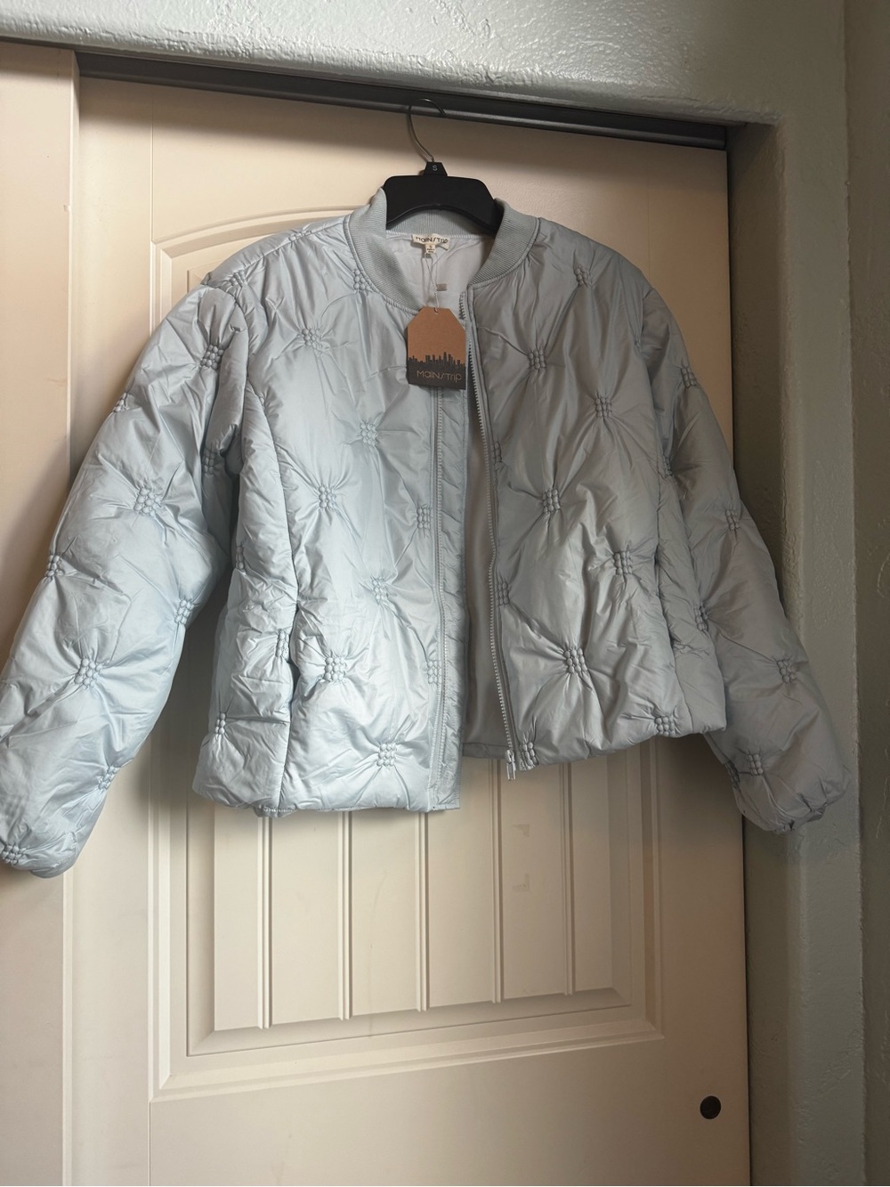 Main Strip Pale Blue Quilted Bomber Jacket